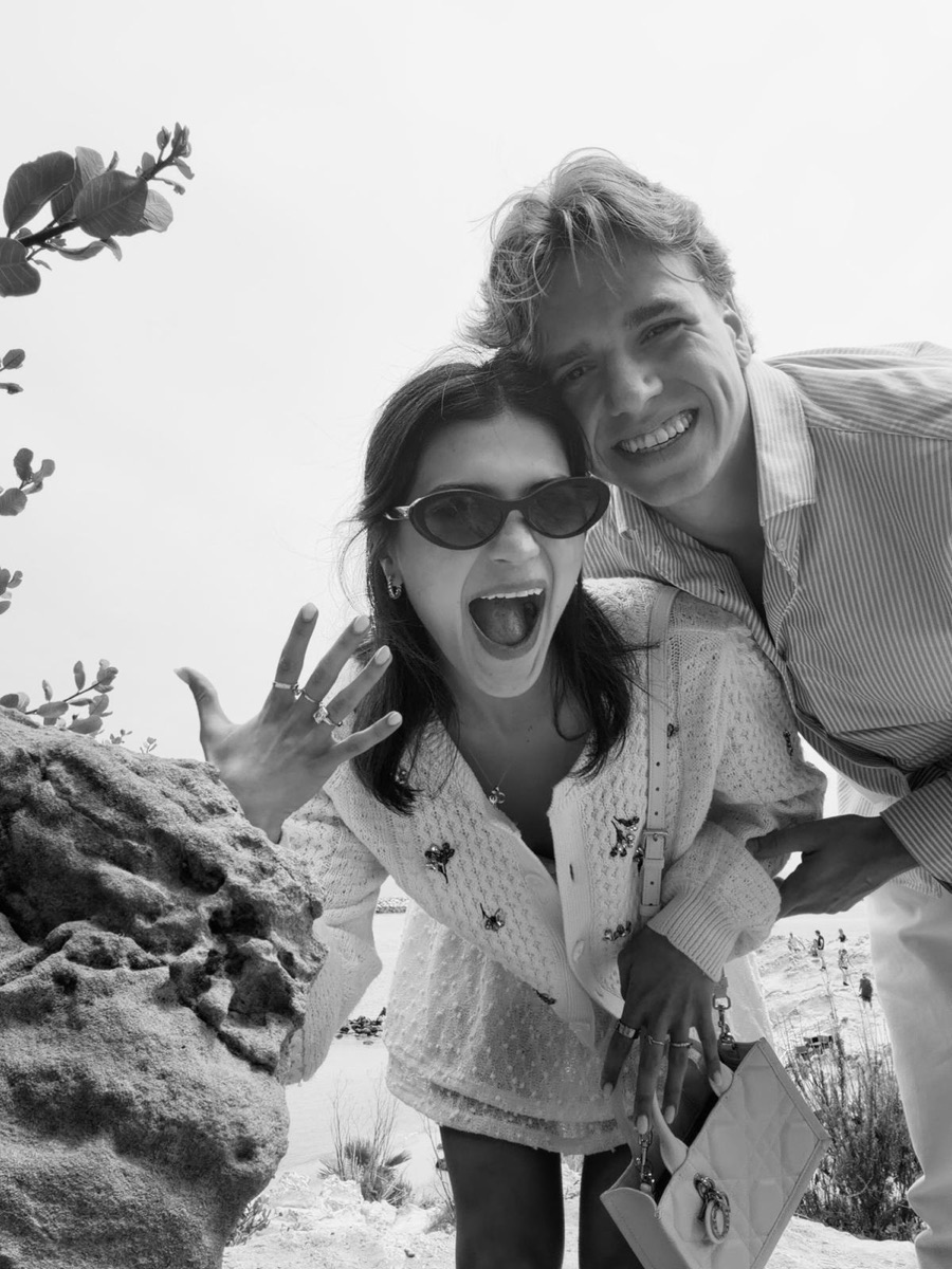 Lorena Paola showing her engagement ring next to Henri